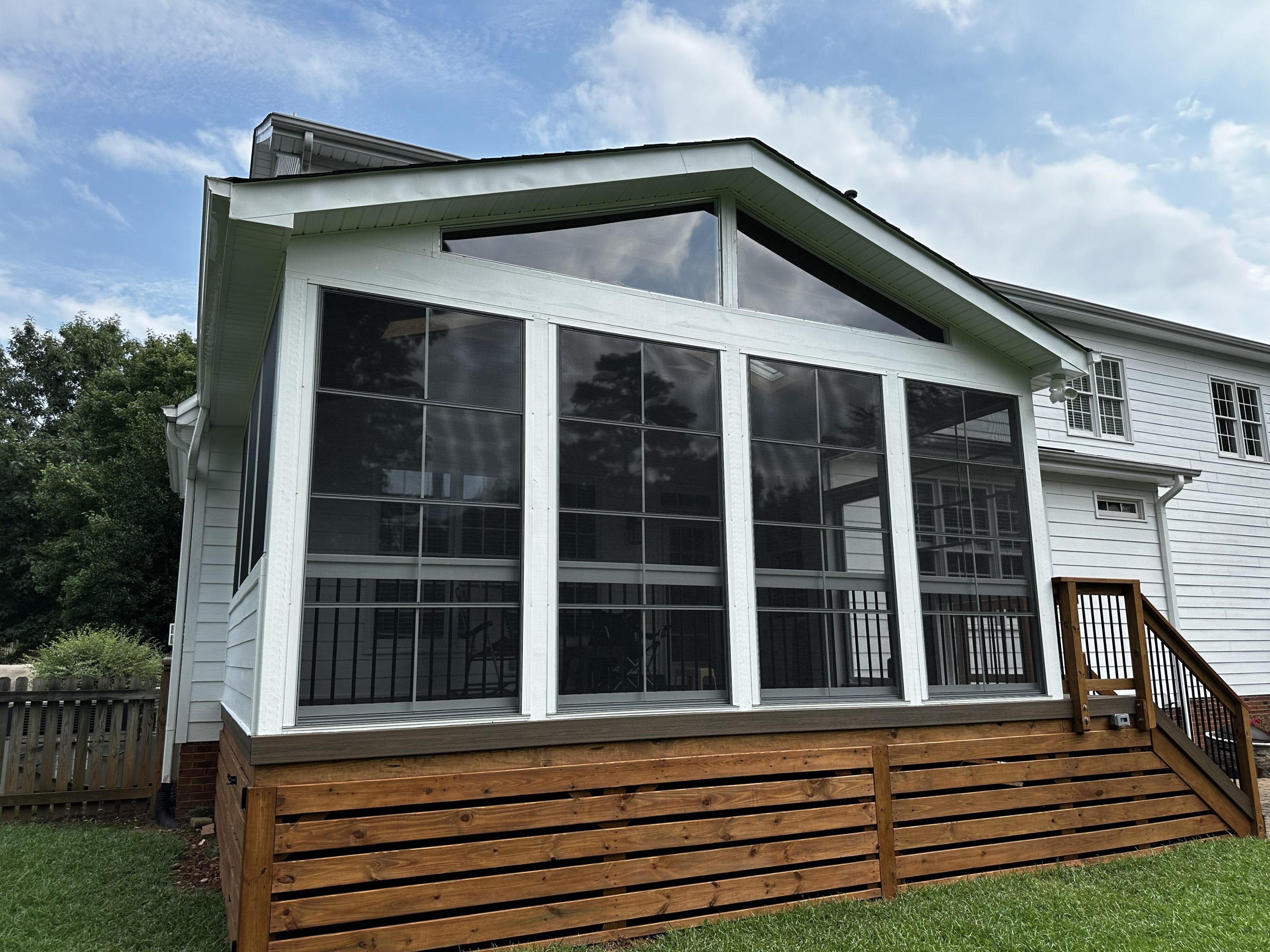 Enclosed deck installation with screened windows from Tripoint Decks